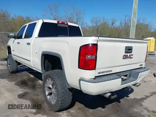 2014 GMC Sierra 1500 SLT with VIN 3GTU2VEC0EG208569, listed as a IAAI auction lot 41834893 with 128,731 mi miles and . Bid and sale history available at DreamBid. Image 3.