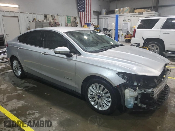 2015 Ford Fusion S Hybrid with VIN 3FA6P0UU8FR307577, listed as a Copart auction lot 51695595 with 145,536 mi miles and Salvage Title. Bid and sale history available at carsss.com. Image 4.
