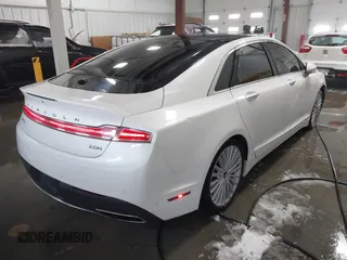 2017 Lincoln MKZ Hybrid Reserve with VIN 3LN6L5MU0HR603355, listed as a IAAI auction lot 41720619 with 142,241 mi miles. Bid and sale history available at carsss.com. Image 4.