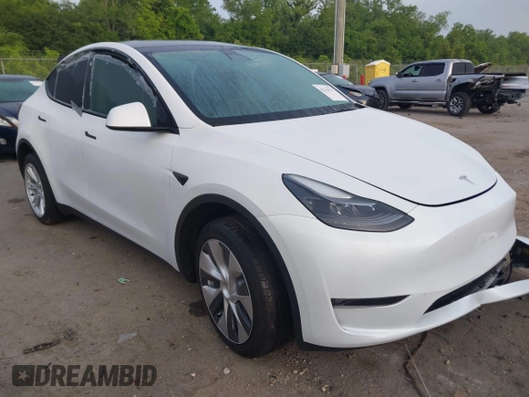 2023 Tesla Model Y Long Range with VIN 7SAYGDEE4PF770307, listed as a IAAI auction lot 42141175 with 34,901 mi miles and . Bid and sale history available at carsss.com. Image 1.