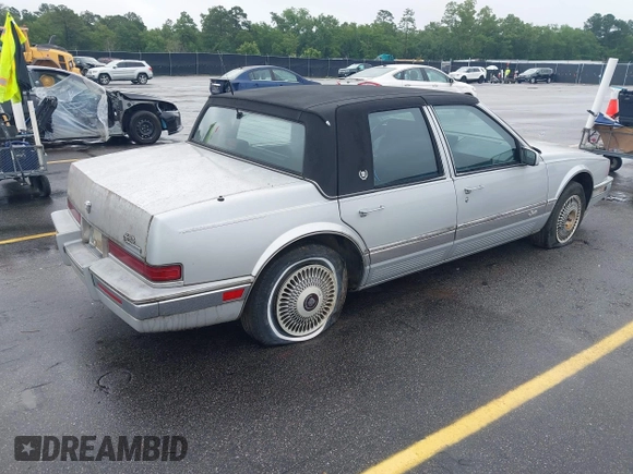 1991 Cadillac Seville z VIN 1G6KS53B2MU813855, wystawiony jako IAAI lot #42425470 z przebiegiem 168 194 mil mil oraz . Historia ofert i sprzedaży dostępna na DreamBid. Obrazek 4.