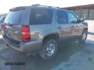 2012 Chevrolet Tahoe LS with VIN 1GNSKAE05CR278255, listed as a IAAI auction lot 41054601 with 205,470 mi miles and . Bid and sale history available at DreamBid. Image 4.