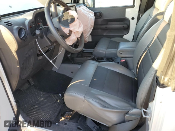 2009 Jeep Wrangler X with VIN 1J4FA241X9L782609, listed as a Copart auction lot 88790305 with 120,450 mi miles and Clean Title. Bid and sale history available at DreamBid. Image 7.