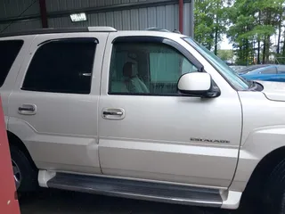 2003 Cadillac Escalade z VIN 1GYEK63NX3R241388, wystawiony jako IAAI lot #42227896 z przebiegiem 154 415 mil mil oraz . Historia ofert i sprzedaży dostępna na DreamBid. Obrazek 13.