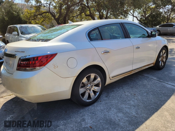 2012 Buick LaCrosse Premium 1 z VIN 1G4GD5E37CF151479, wystawiony jako IAAI lot #41710321 z przebiegiem 156 673 mil mil oraz . Historia ofert i sprzedaży dostępna na DreamBid. Obrazek 4.