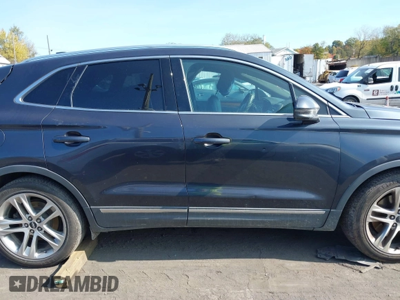 2015 Lincoln MKC with VIN 5LMCJ2A93FUJ24373, listed as a IAAI auction lot 40638009 with 127,336 mi miles. Bid and sale history available at carsss.com. Image 13.