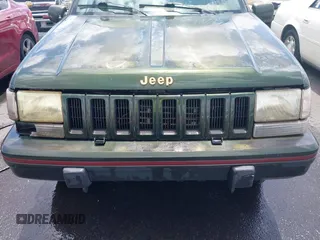 1995 Jeep Grand Cherokee Limited с VIN 1J4GZ78Y2SC558015, выставлен на аукционе IAAI как лот 42513097 с пробегом 218 392 миль миль и . История ставок и продаж доступна на DreamBid. Изображение 6.