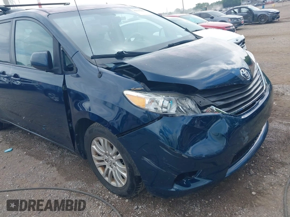 2011 Toyota Sienna XLE AAS with VIN 5TDYK3DC6BS045303, listed as a IAAI auction lot 42515203 with 205,904 mi miles and . Bid and sale history available at DreamBid. Image 6.
