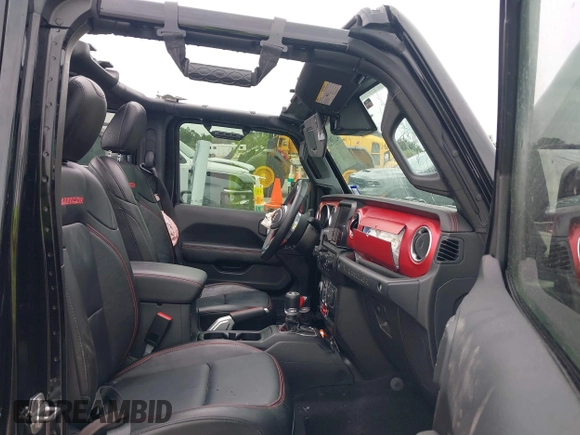2021 Jeep Wrangler Unlimited Rubicon with VIN 1C4HJXFG7MW662092, listed as a IAAI auction lot 42139521 with 32,055 mi miles and . Bid and sale history available at DreamBid. Image 5.