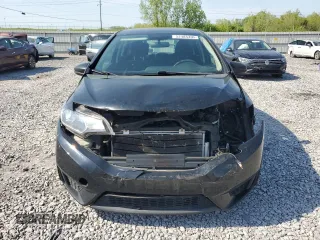 2015 Honda Fit LX with VIN 3HGGK5H56FM736969, listed as a Copart auction lot 52485405 with 142,736 mi miles and Salvage Title. Bid and sale history available at carsss.com. Image 5.