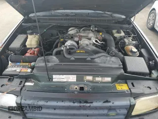 1999 Land Rover Discovery z VIN SALTY1245XA222879, wystawiony jako Copart lot #74222444 z przebiegiem Nie podano mil oraz Nie do naprawy. Historia ofert i sprzedaży dostępna na DreamBid. Obrazek 12.