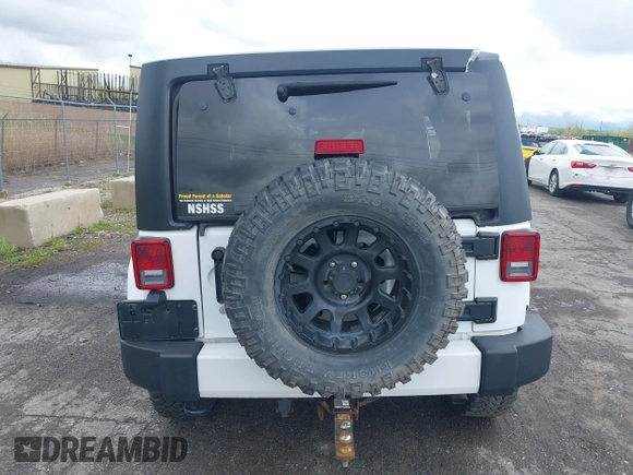 2016 Jeep Wrangler Unlimited Sahara with VIN 1C4BJWEG8GL129577, listed as a IAAI auction lot 42184373 with 185,761 mi miles and . Bid and sale history available at DreamBid. Image 15.