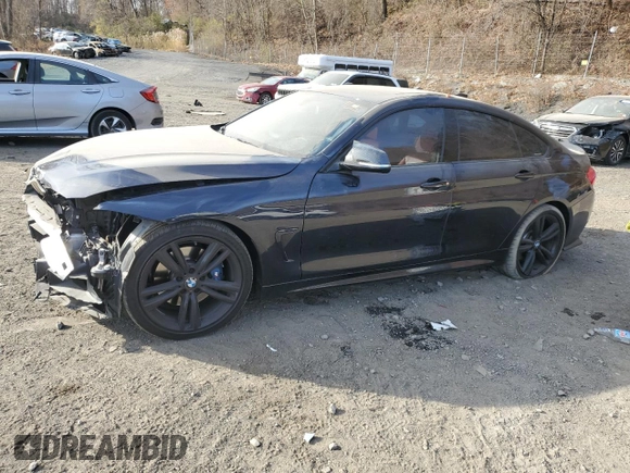 2015 BMW 4 Series 435i with VIN WBA4B1C5XFD955296, listed as a Copart auction lot 79456744 with 98,285 mi miles and Salvage Title. Bid and sale history available at DreamBid. Image 1.