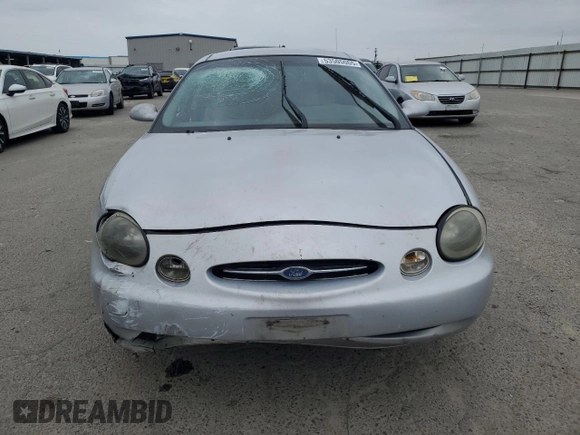 1999 Ford Taurus SE with VIN 1FAFP53U9XG290036, listed as a Copart auction lot 53505065 with 200,149 mi miles and Salvage title. Bid and sale history available at DreamBid. Image 5.