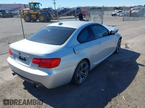 2013 BMW 3 Series 335i xDrive with VIN WBAKF9C56DE860199, listed as a IAAI auction lot 41823376 with Not provided miles and . Bid and sale history available at DreamBid. Image 4.