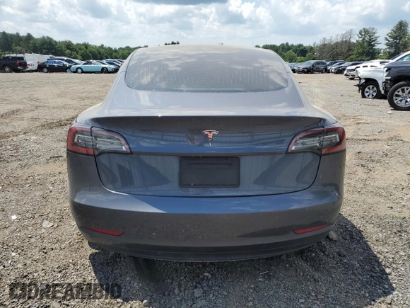 2020 Tesla Model 3 Standard Range Plus with VIN 5YJ3E1EA6LF614045, listed as a Copart auction lot 65222584 with 59,823 mi miles and Salvage Title. Bid and sale history available at DreamBid. Image 6.