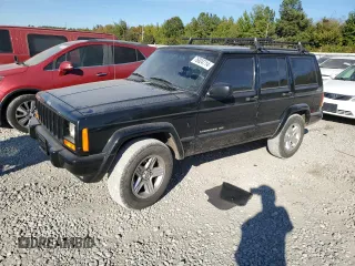 2001 Jeep Cherokee Sport z VIN 1J4FF58S61L612533, wystawiony jako Copart lot #76824714 z przebiegiem 62 401 mil mil oraz Szkoda całkowita • Salvage title. Historia ofert i sprzedaży dostępna na DreamBid. Obrazek 1.