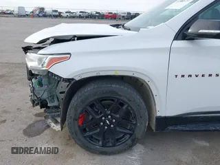 2018 Chevrolet Traverse Premier z VIN 1GNEVJKW0JJ229036, wystawiony jako IAAI lot #41866737 z przebiegiem 126 794 mil mil oraz . Historia ofert i sprzedaży dostępna na DreamBid. Obrazek 21.