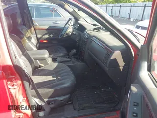 2000 Jeep Grand Cherokee Limited with VIN 1J4GW58N5YC186410, listed as a IAAI auction lot 42504152 with 140,982 mi miles and . Bid and sale history available at DreamBid. Image 5.