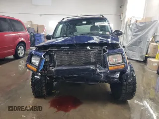 1997 Jeep Cherokee Country with VIN 1J4FJ78S0VL592781, listed as a Copart auction lot 83209464 with 287,206 mi miles and Salvage Title. Bid and sale history available at carsss.com. Image 5.