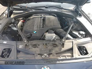 2015 BMW 5 Series 535i with VIN WBA5B1C58FG127959, listed as a IAAI auction lot 41571017 with 122,274 mi miles and . Bid and sale history available at carsss.com. Image 10.