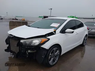 2016 Kia Forte EX with VIN KNAFX4A82G5450616, listed as a IAAI auction lot 42107042 with 131,419 mi miles. Bid and sale history available at carsss.com. Image 21.