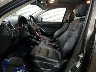 2016 Mazda CX-5 Grand Touring with VIN JM3KE4DY4G0600877, listed as a Copart auction lot 85560194 with 82,395 mi miles and Salvage Title. Bid and sale history available at carsss.com. Image 7.