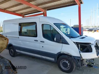 2017 Ford Transit z VIN 1FTYE2CM1HKA13709, wystawiony jako IAAI lot #41933179 z przebiegiem 147 539 mil mil oraz . Historia ofert i sprzedaży dostępna na DreamBid. Obrazek 13.