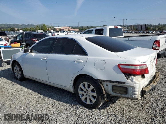 2007 Toyota Camry CE with VIN 4T1BE46K67U572411, listed as a Copart auction lot 54448655 with 290,790 mi miles and Salvage Title. Bid and sale history available at carsss.com. Image 2.