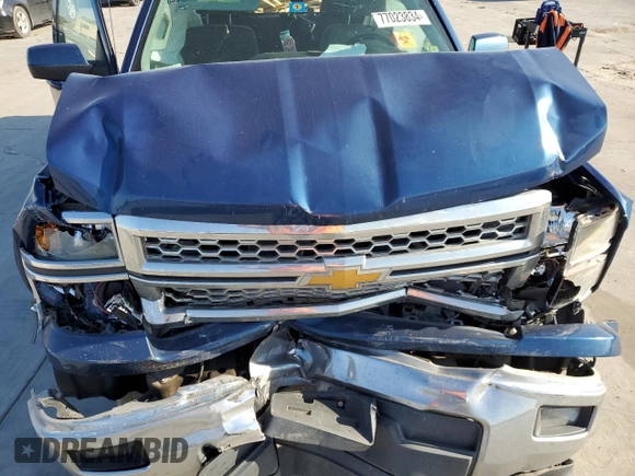 2015 Chevrolet Silverado 1500 LT with VIN 1GCRCREC9FZ173994, listed as a Copart auction lot 77023834 with 107,624 mi miles and Salvage Title. Bid and sale history available at DreamBid. Image 11.