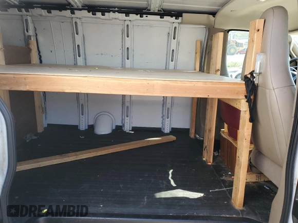 2017 Chevrolet Express Cargo Van with VIN 1GCWGBFG7H1135696, listed as a Copart auction lot 77438324 with 100,675 mi miles and Salvage Title. Bid and sale history available at carsss.com. Image 11.