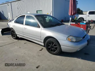 1998 Ford Contour z VIN 3FAFP66L8WM142974, wystawiony jako Copart lot #42175265 z przebiegiem 195 277 mil mil oraz Szkoda całkowita • Salvage title. Historia ofert i sprzedaży dostępna na DreamBid. Obrazek 4.
