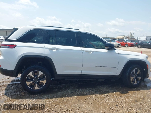 2023 Jeep Grand Cherokee with VIN 1C4RJYB63PC649000, listed as a IAAI auction lot 42306975 with 29,948 mi miles and . Bid and sale history available at DreamBid. Image 13.