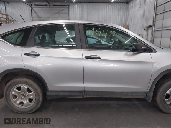 2014 Honda CR-V LX with VIN 2HKRM4H38EH723171, listed as a IAAI auction lot 41931115 with 132,417 mi miles and . Bid and sale history available at carsss.com. Image 13.