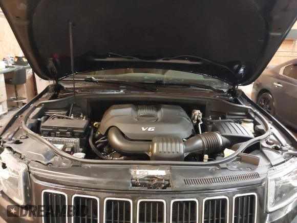 2015 Jeep Grand Cherokee Limited with VIN 1C4RJFBG8FC910133, listed as a IAAI auction lot 41289929 with 141,226 mi miles. Bid and sale history available at carsss.com. Image 10.