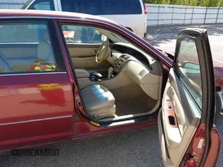 2001 Toyota Avalon XL z VIN 4T1BF28B41U178086, wystawiony jako IAAI lot #42253446 z przebiegiem 249 390 mil mil oraz . Historia ofert i sprzedaży dostępna na DreamBid. Obrazek 5.