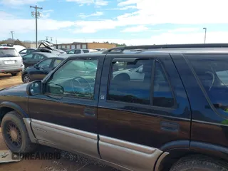 2000 GMC Jimmy SLE Convenience with VIN 1GKDT13W8Y2168245, listed as a IAAI auction lot 41348643 with 285,714 mi miles. Bid and sale history available at carsss.com. Image 14.