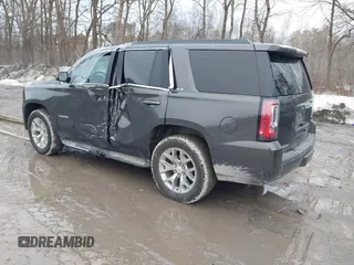 2019 GMC Yukon SLE with VIN 1GKS2AKC1KR385085, listed as a IAAI auction lot 41699370 with 83,889 mi miles. Bid and sale history available at carsss.com. Image 3.