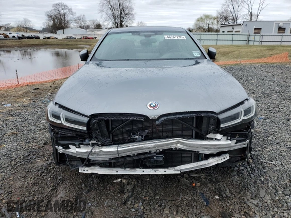2023 BMW 5 Series M550i xDrive with VIN WBA13BK06PCN02733, listed as a Copart auction lot 48767235 with 27,725 mi miles and Salvage title. Bid and sale history available at DreamBid. Image 5.
