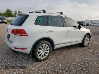 2012 Volkswagen Touareg Sport z VIN WVGEF9BP4CD007058, wystawiony jako Copart lot #56971745 z przebiegiem 181 221 mil mil oraz Czysty tytuł • Clean title. Historia ofert i sprzedaży dostępna na DreamBid. Obrazek 3.