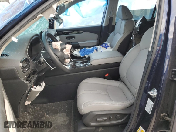 2025 Honda Pilot Touring с VIN 5FNYG1H76SB015211, выставлен на аукционе Copart как лот 53293995 с пробегом 12 177 миль миль и Списание • Salvage title. История ставок и продаж доступна на DreamBid. Изображение 7.