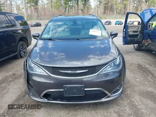 2017 Chrysler Pacifica Touring L with VIN 2C4RC1BGXHR667397, listed as a IAAI auction lot 42085117 with 63,996 mi miles and . Bid and sale history available at DreamBid. Image 12.