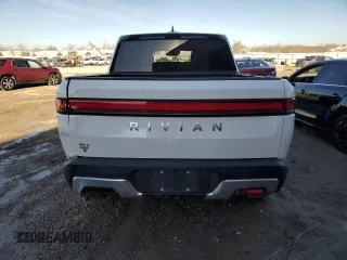 2023 Rivian R1T Adventure z VIN 7FCTGAAA9PN021913, wystawiony jako Copart lot #46222995 z przebiegiem 41 888 mil mil oraz Szkody całkowita. Historia ofert i sprzedaży dostępna na DreamBid. Obrazek 6.