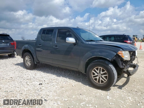 2015 Nissan Frontier SV with VIN 1N6AD0ER5FN702226, listed as a Copart auction lot 64325105 with 168,148 mi miles and Salvage title. Bid and sale history available at DreamBid. Image 4.