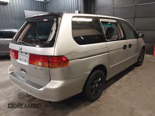 2002 Honda Odyssey LX z VIN 2HKRL18532H573727, wystawiony jako IAAI lot #42266783 z przebiegiem 127 491 mil mil oraz . Historia ofert i sprzedaży dostępna na DreamBid. Obrazek 4.