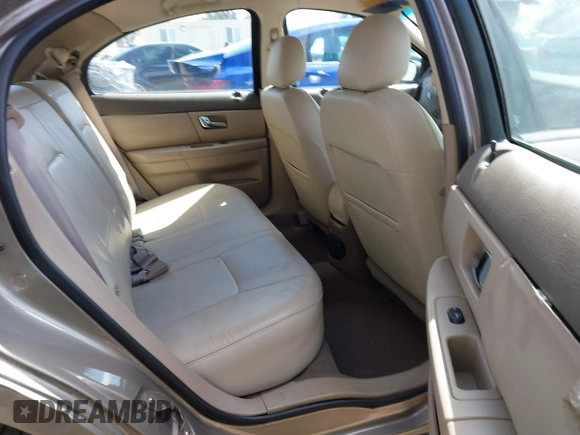 2002 Ford Taurus z VIN 1FAHP59U52G115825, wystawiony jako IAAI lot #41904552 z przebiegiem 91 004 mil mil oraz . Historia ofert i sprzedaży dostępna na DreamBid. Obrazek 8.