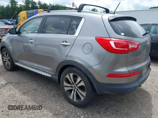 2013 Kia Sportage EX with VIN KNDPCCA26D7428000, listed as a IAAI auction lot 42684573 with 155,722 mi miles and . Bid and sale history available at DreamBid. Image 3.