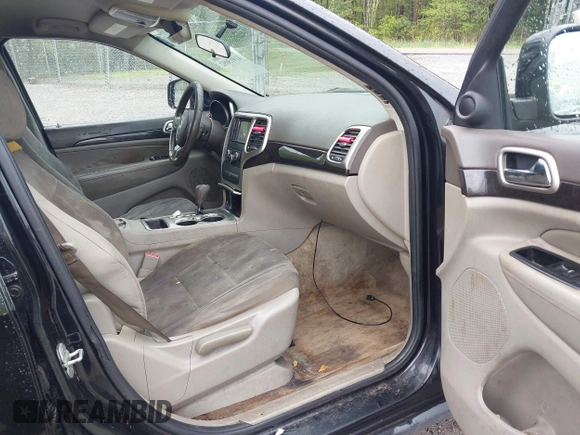2011 Jeep Grand Cherokee Laredo with VIN 1J4RS4GG7BC569287, listed as a IAAI auction lot 41915092 with 211,148 mi miles and . Bid and sale history available at DreamBid. Image 5.