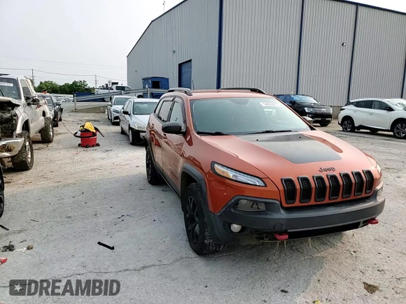2015 Jeep Cherokee Trailhawk with VIN 1C4PJMBS0FW675807, listed as a Copart auction lot 58800615 with 109,019 mi miles and Salvage title. Bid and sale history available at DreamBid. Image 14.
