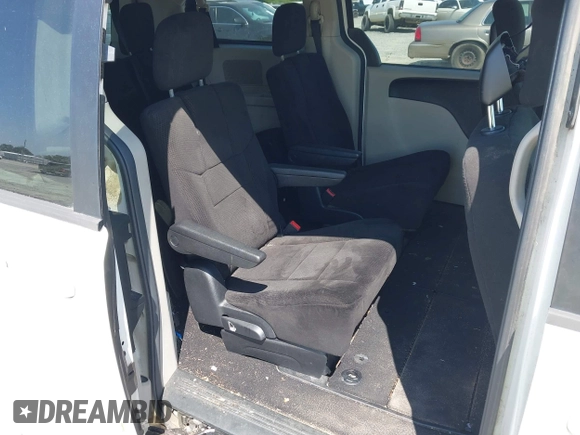 2013 Dodge Grand Caravan SE with VIN 2C4RDGBG9DR516044, listed as a IAAI auction lot 41998893 with 214,645 mi miles and . Bid and sale history available at DreamBid. Image 8.